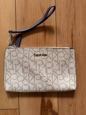 Calvin Klein Cream Logo Wristlet Clutch